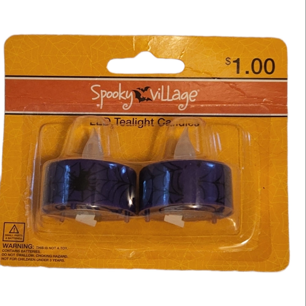 Sold Spooky Village LED tealight candles